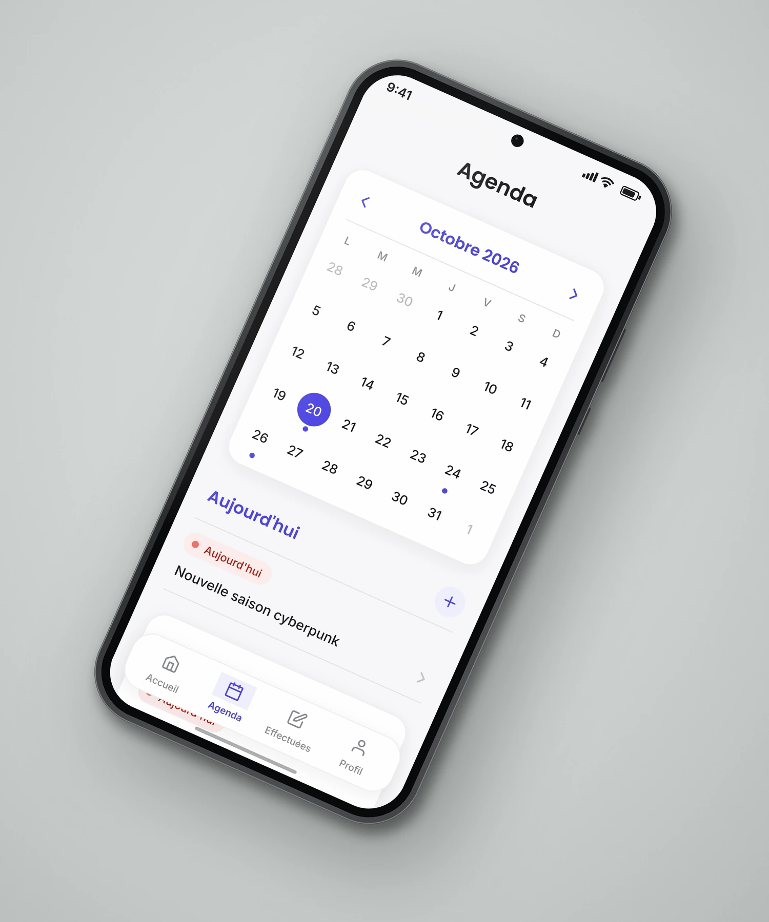 Écran Agenda de Mon Planning : calendrier du mois avec les jours chargés signalés par un point, et les éléments du jour en dessous.